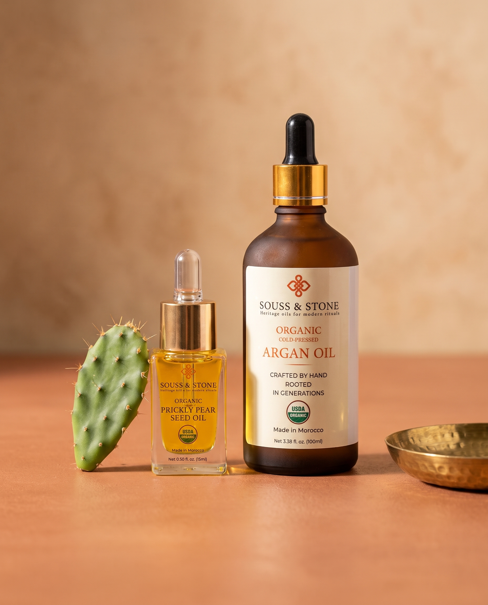 Moroccan Oil Duo -- Organic Prickly Pear Seed Oil and Organic Moroccan Argan Oil bottles grouped together
